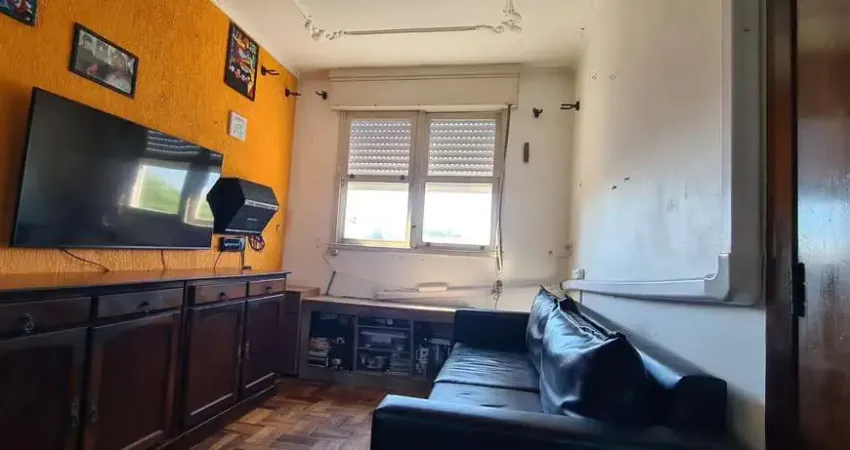 Apartamento de 2 dormitorios e vaga de garagem rotativa em Porto Alegre.