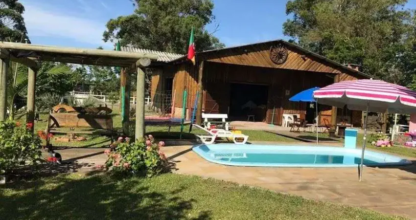 Belíssimo sítio com duas casas e grande área de lazer, à venda, por r$ 1.250.000 - rancho velho - capivari do sul/rs