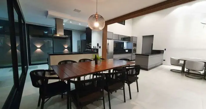 Casa de condomínio térrea para venda tem 297 metros quadrados com 4 quartos