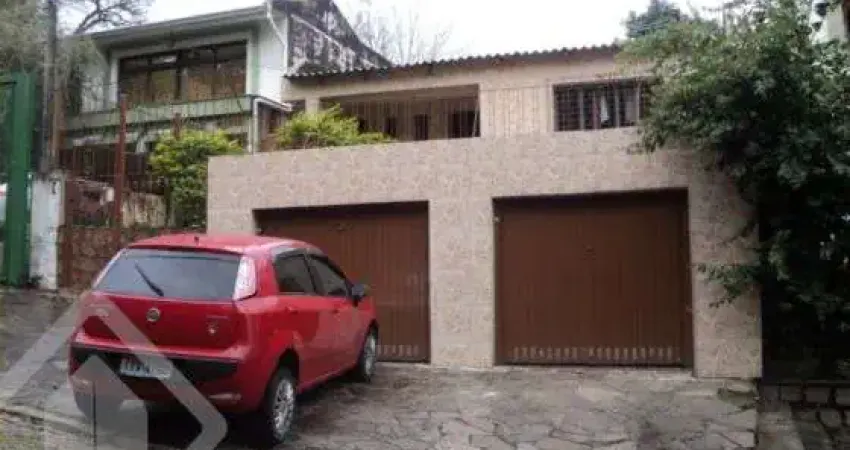 Casa em condomínio fechado com 3 quartos à venda na Rua Jataí, 860, Cristal, Porto Alegre