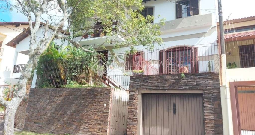 Casa em condomínio fechado com 4 quartos à venda na Rua Nero José da Silva Filho, 205, Partenon, Porto Alegre