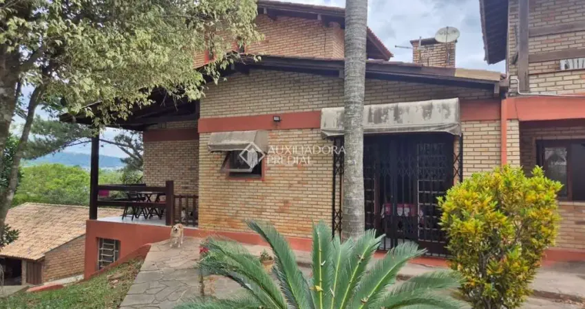 Casa com 4 quartos à venda na Rua Pedro de Oliveira França, 80, Hípica, Porto Alegre