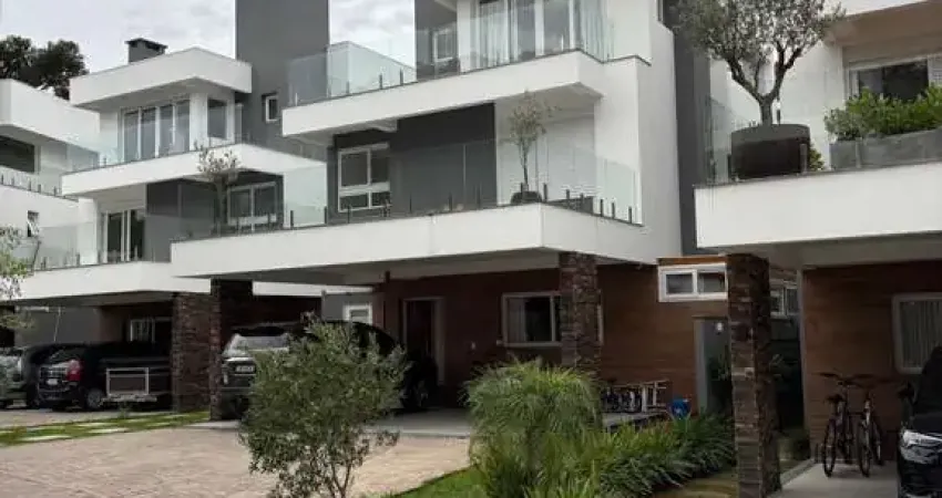 Casa em condomínio fechado com 3 quartos à venda na Avenida Coronel Marcos, 1239, Pedra Redonda, Porto Alegre