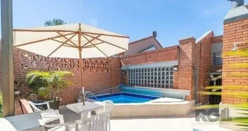 Casa em condomínio fechado com 3 quartos à venda na Avenida Jacuí, 978, Cristal, Porto Alegre