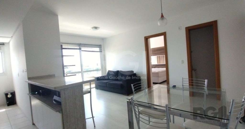 Apartamento mobiliado, 57m2, 1 suite, 1 vaga, lareira e churrasqueira, localizad