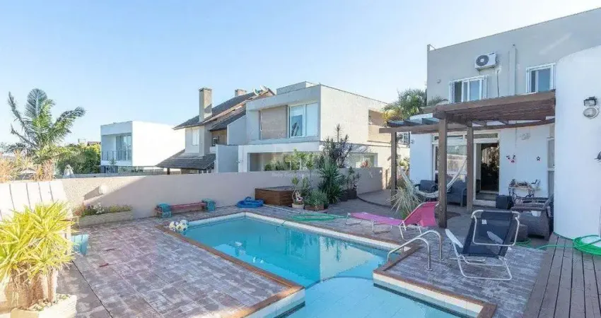 Casa com 4 quartos à venda na Avenida Edgar Pires de Castro, 540, Hípica, Porto Alegre