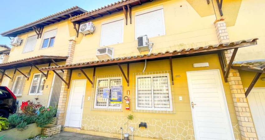 Casa de dois quartos, uma vaga de garagem, em condomínio fechado em Porto Alegre