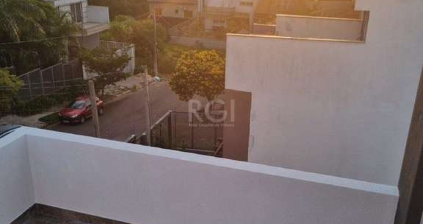 Casa com 3 quartos à venda na Rua Cônego Aleixo, 61, Guarujá, Porto Alegre