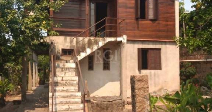 Casa 4 dormitórios à venda Vila Nova Porto Alegre/RS