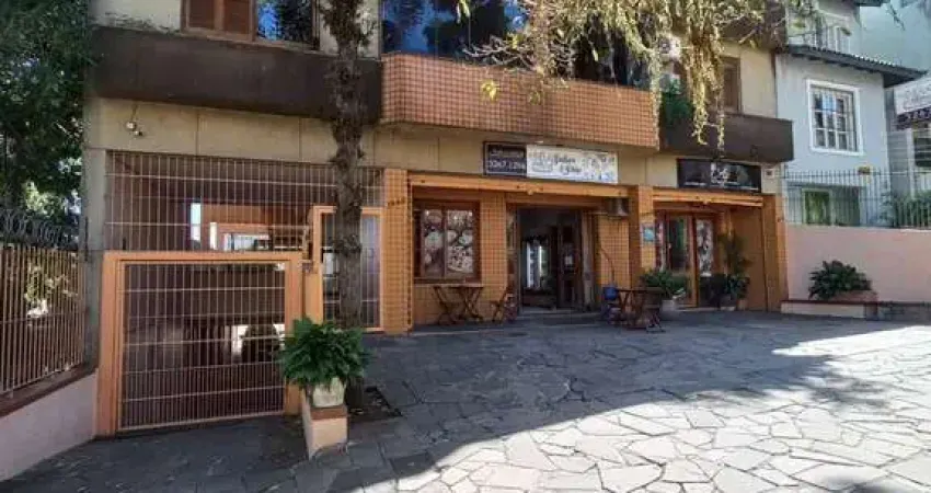 Apartamento 2 dormitórios, lareira, churrasqueira, 1 vaga de garagem escriturada