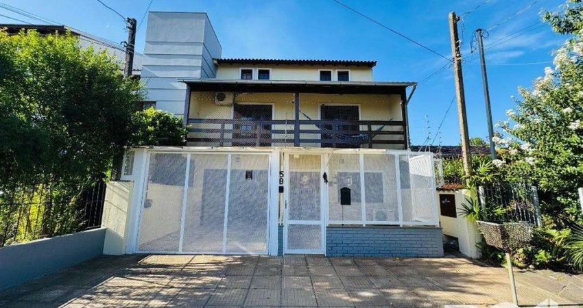 Casa com 4 quartos à venda na Rua Hermínio Bittencourt, 58, Hípica, Porto Alegre