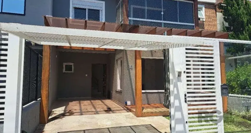 Casa com 3 quartos à venda na Rua Aldo Sani, 84, Hípica, Porto Alegre