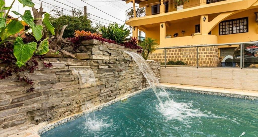 Casa com 4 quartos à venda na Rua Moacir Bastiani, 334, Campo Novo, Porto Alegre