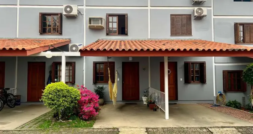 Casa em condomínio fechado com 94m2, 3 dormitórios no bairro camaquã.