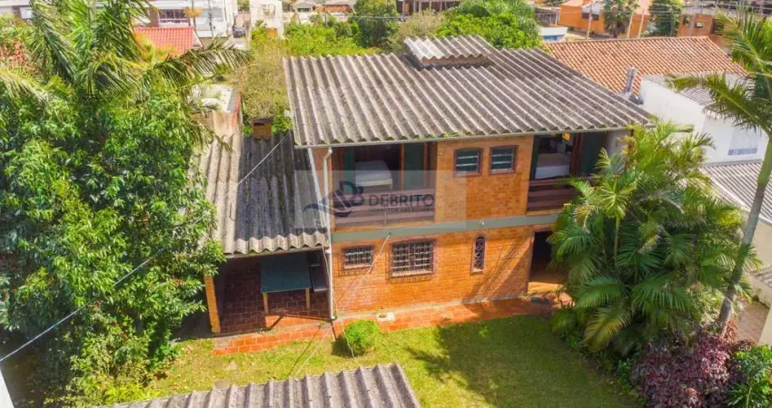 Casa para Venda em Tramandaí, Centro, 7 dormitórios, 5 banheiros, 2 vagas