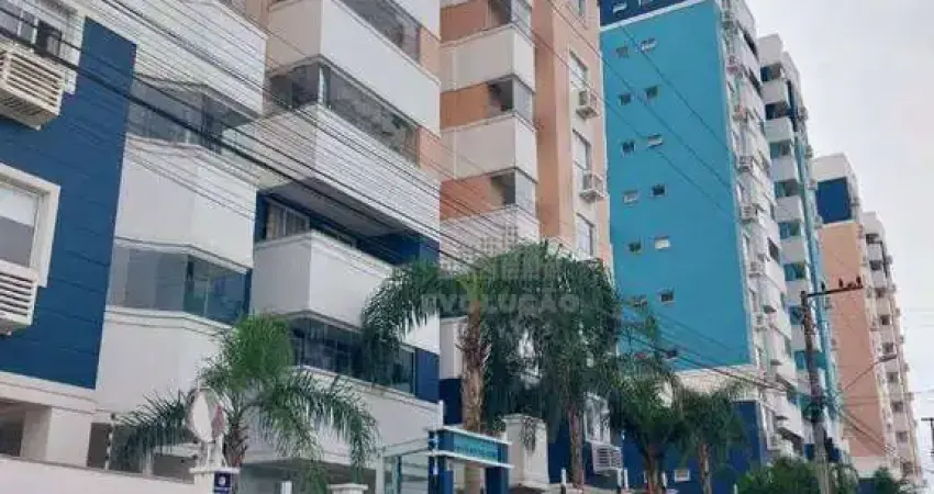 Apartamento de 2 dormitórios, sendo 1 suíte, sala grande para 2 ambientes, sacada com churrasqueira a carvão, cozinha com móveis planejados.