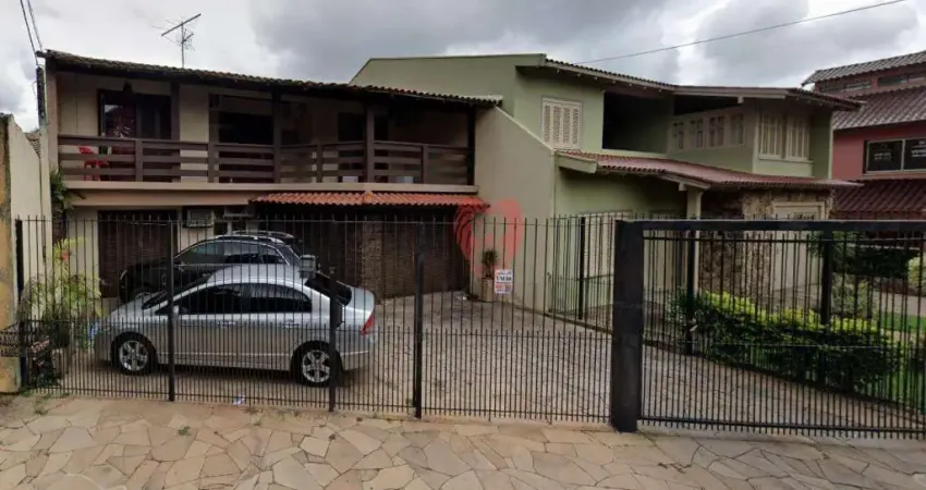 Casa com 3 dormitórios à venda, 70 m² por R$ 692.000,00 - Oriço - Gravataí/RS
