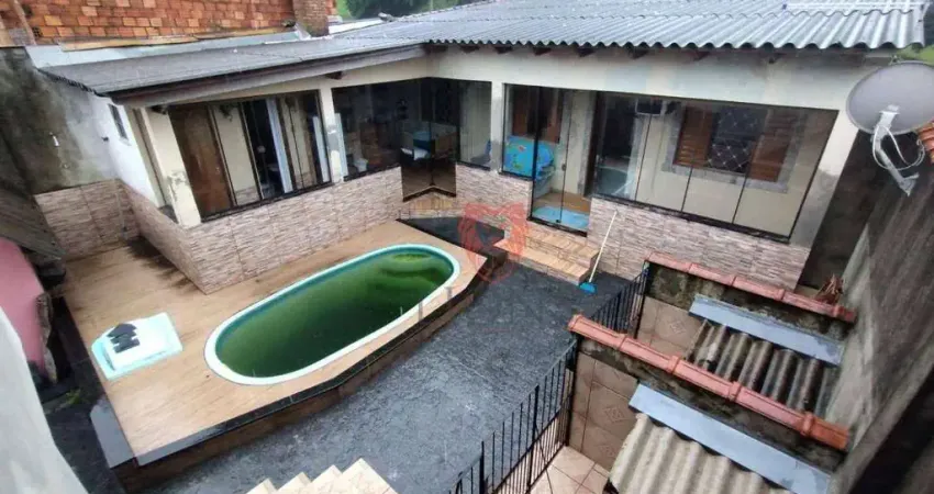 Casa com 3 dormitórios à venda, 43 m² por R$ 456.000,00 - Vera Cruz - Gravataí/RS