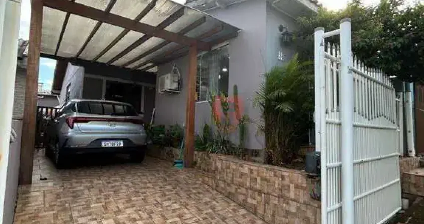Casa com 2 dormitórios à venda, 100 m² por R$ 383.000 - Ibiza - Gravataí/RS