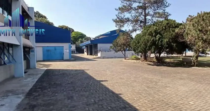 TERRENO COM GALPÕES Á VENDA - A.T. 7.430m² . AC. 2.816m² (5 galpões+adm)