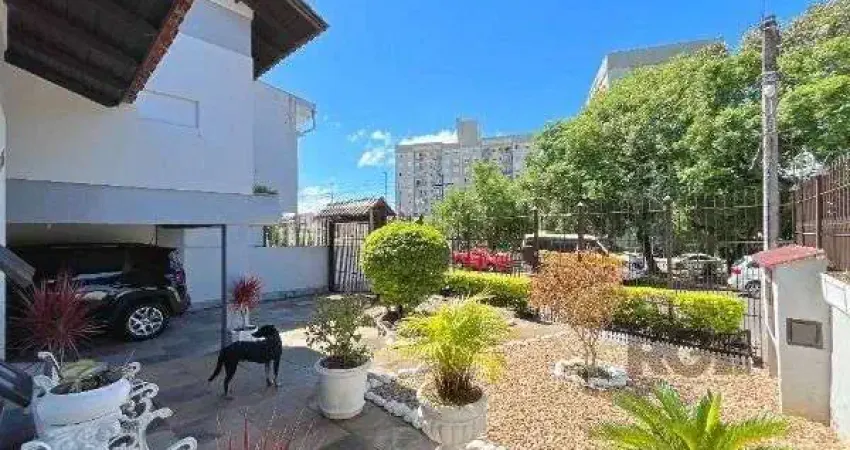 Casa com 4 quartos à venda na Rua Afonso Arinos, 625, Camaquã, Porto Alegre