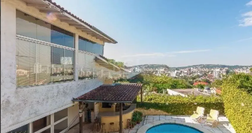 Casa com 5 quartos à venda na Rua Coroados, 536, Vila Assunção, Porto Alegre