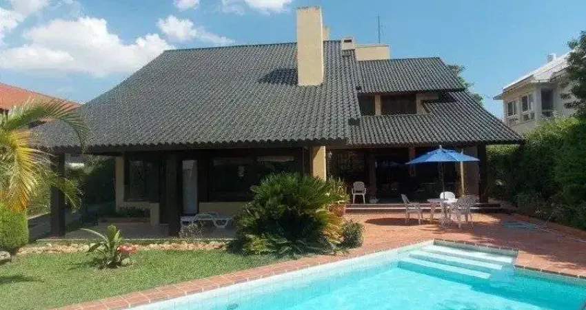 Casa em condomínio fechado com 4 quartos à venda na Avenida da Cavalhada, 5205, Cavalhada, Porto Alegre