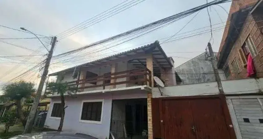 Casa à venda na Rua Hesiodo Andrade, 272, Hípica, Porto Alegre