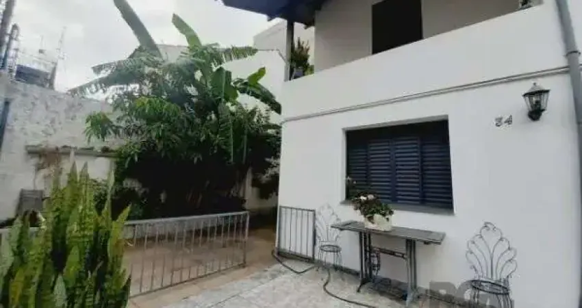 Casa com 4 quartos à venda na Rua Barão de Cerro Largo, 34, Menino Deus, Porto Alegre