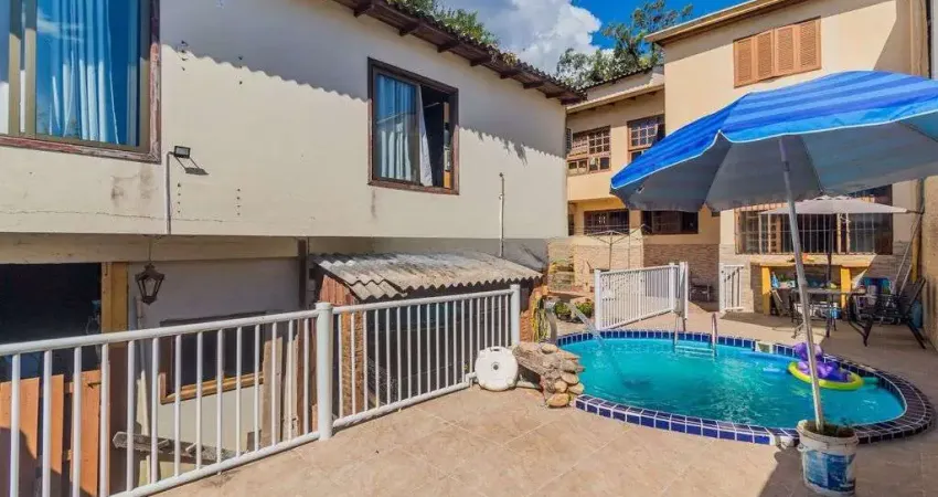 Casa 4 dormitórios à venda no Bairro Nonoai - Porto Alegre