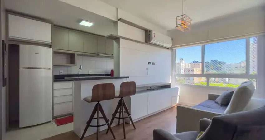 Excelente apartamento 2 dormitorios semi mobiliado localizado na cidade baixa