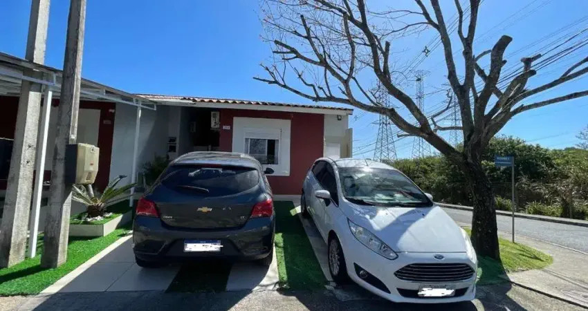 Casa com 3 quartos e 2 vagas em Alvorada no Condomínio Terra Nova