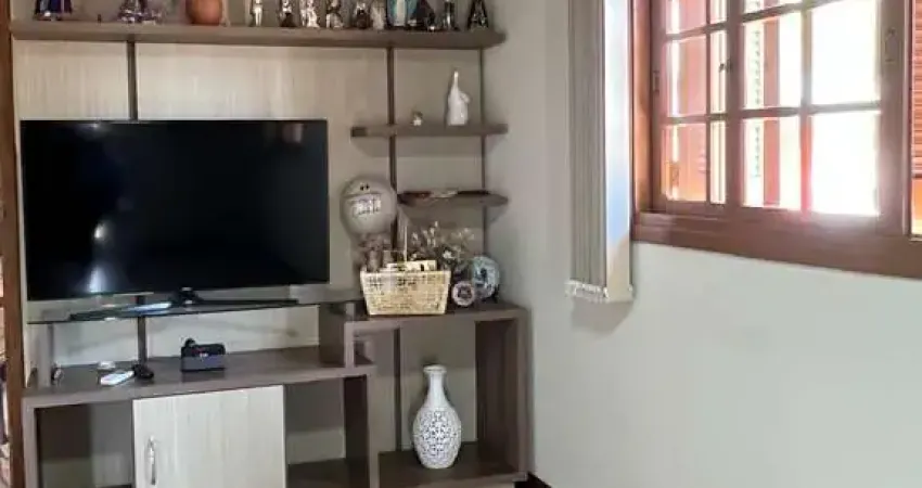 Casa com 4 quartos à venda na Rua Santos, 285, Campo Novo, Porto Alegre