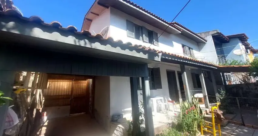 Casa com 4 quartos à venda na Rua Hermínio Leal de Albuquerque, 1005, Parque Santa Fé, Porto Alegre