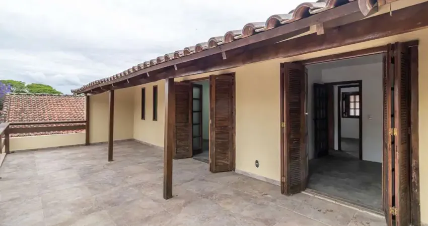 Casa com 4 quartos à venda na Rua Dom Jaime de Barros Câmara, 325, Sarandi, Porto Alegre
