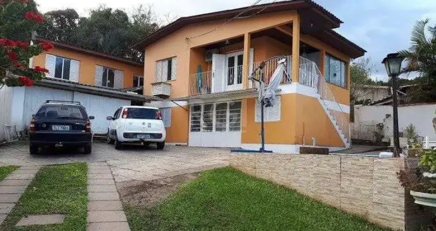Casa com 4 quartos à venda na Rua José Alves de Castro, 468, Vila Nova, Porto Alegre