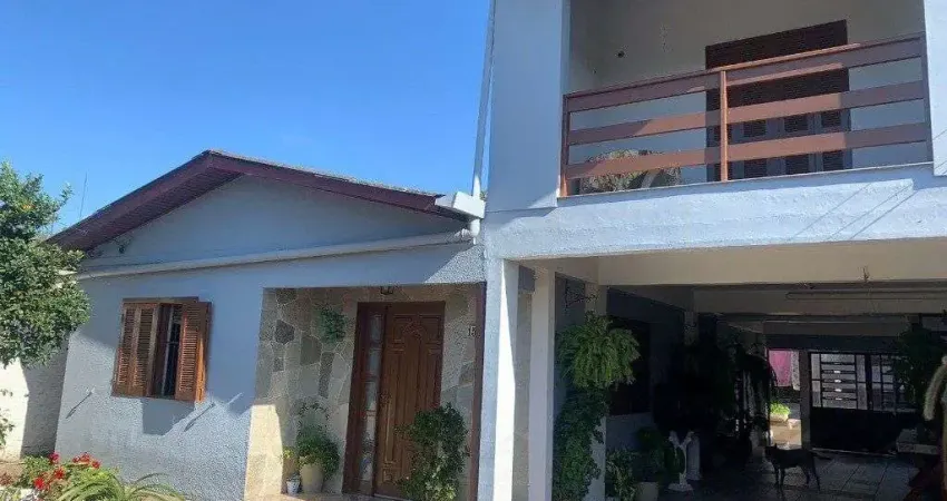 Casa com 4 quartos à venda na Rua Osvaldo Cruz, 159, Maringá, Alvorada
