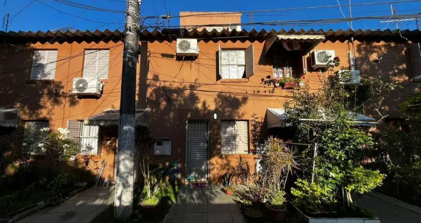 Casa em condomínio fechado com 3 quartos à venda na Rua Mura, 356, Guarujá, Porto Alegre