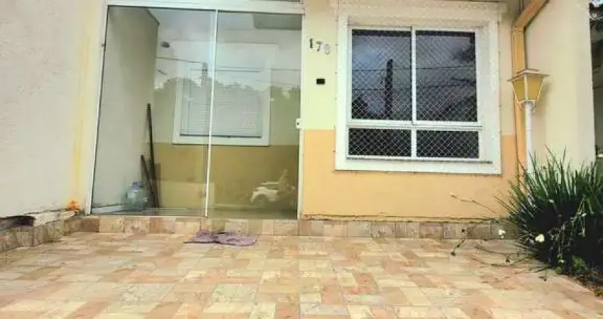 Casa em condomínio fechado com 2 quartos à venda na Estrada Costa Gama, 5124, Restinga, Porto Alegre