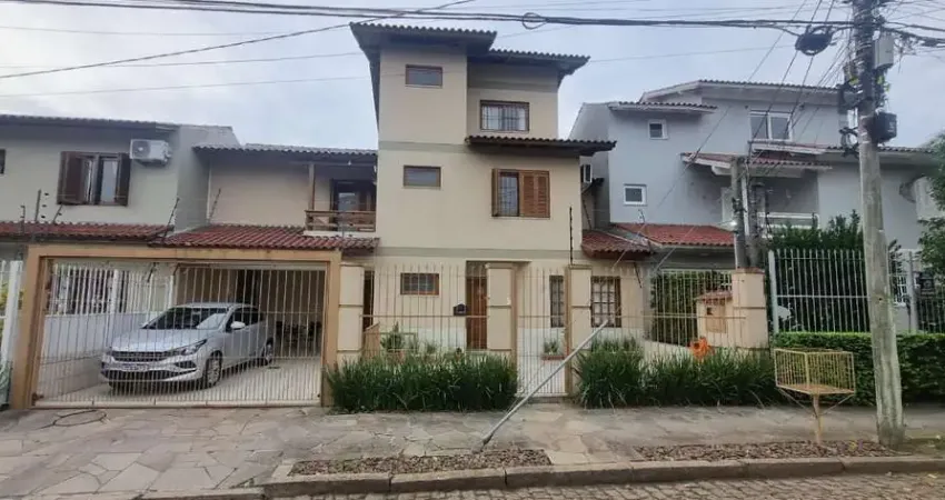 Casa com 3 quartos à venda na Rua Luiz Delfino, 109, Espírito Santo, Porto Alegre
