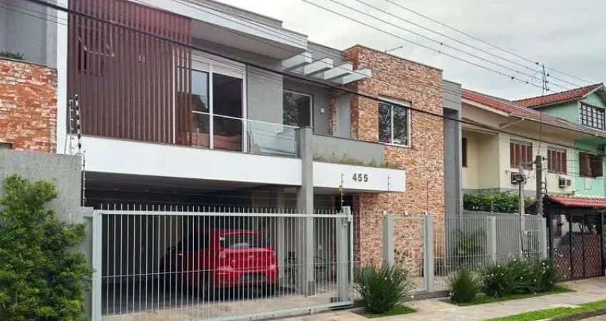 Casa contemporânea, 4 d, sendo 2 suítes, uma no térreo,206 m² , bairro tristeza