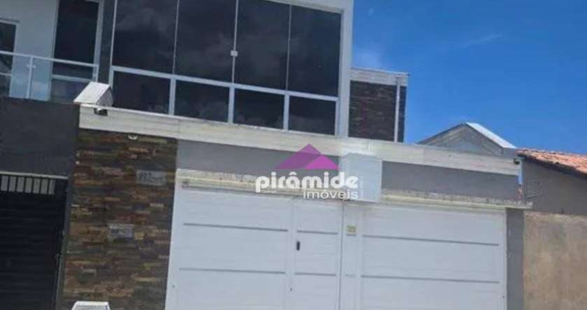 Casa com 2 dormitórios à venda, 104 m² por R$ 590.000,00 - Balneário dos Golfinhos - Caraguatatuba/SP