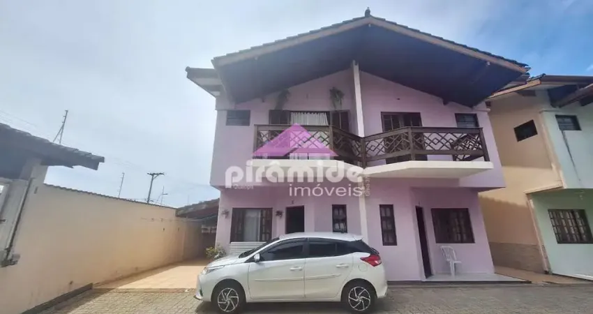 Casa com 3 dormitórios à venda, 103 m² por R$ 650.000,00 - Massaguaçu - Caraguatatuba/SP