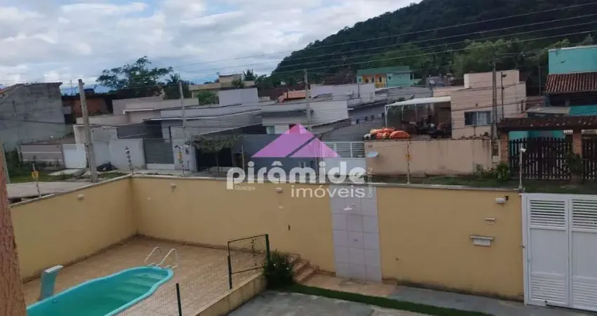 Casa com 2 dormitórios à venda, 75 m² por R$ 420.000,00 - Massaguaçu - Caraguatatuba/SP