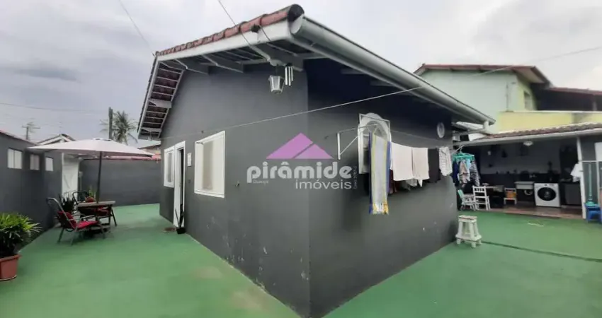 Casa com 3 dormitórios à venda, 107 m² por R$ 500.000,00 - Travessão - Caraguatatuba/SP
