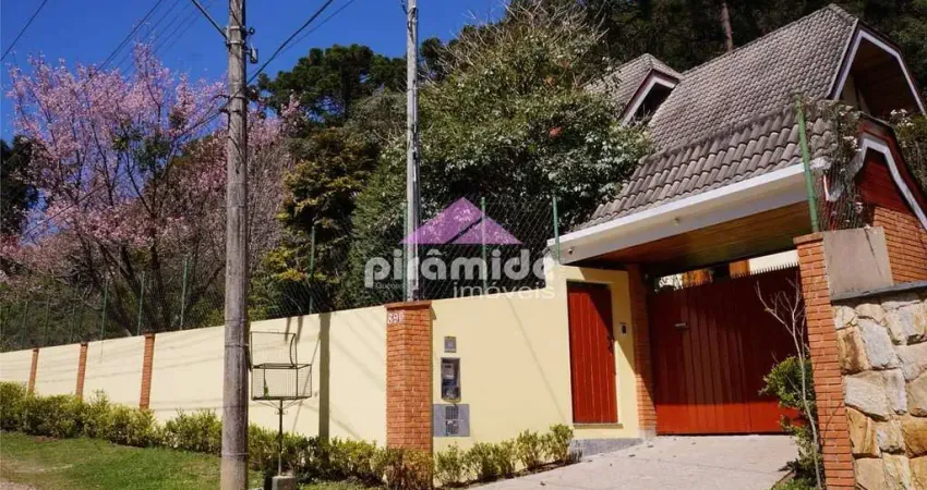 Casa à venda, 350 m² por R$ 1.500.000,00 - Vila Capivari - Campos do Jordão/SP
