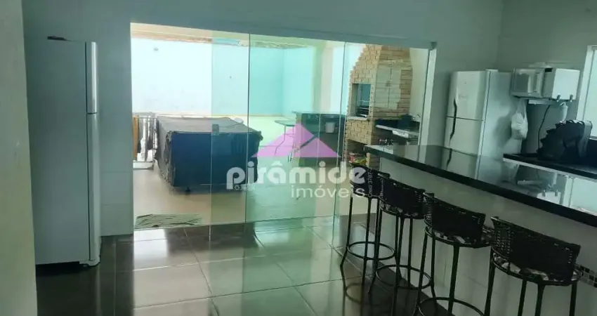Casa com 4 dormitórios à venda, 184 m² por R$ 1.050.000,00 - Massaguaçu - Caraguatatuba/SP