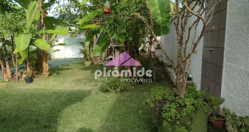 Casa com 2 dormitórios para alugar, 130 m² por R$ 5.322,66/mês - Centro - Caraguatatuba/SP