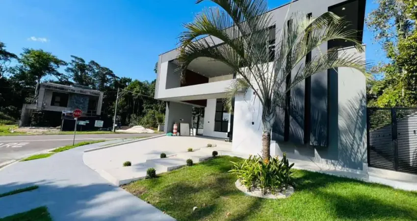 CASA TÉRREA ESPETACULAR À VENDA NO ALPHAVILLE 4 – PONTA NEGRA  4 Suítes | Pé-direito Duplo | Fachada Imponente | Altíssimo Padrão