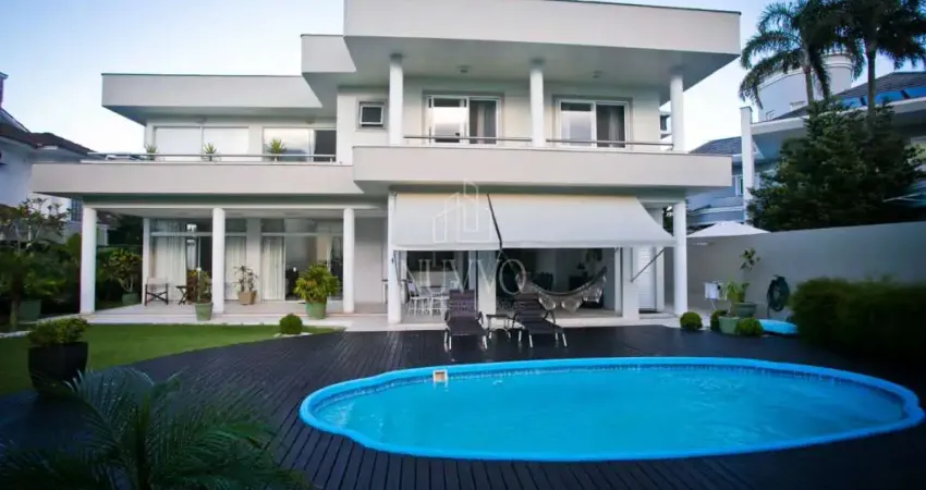 Casa à venda em jurerê internacional com 6 dormitórios e 5 suítes